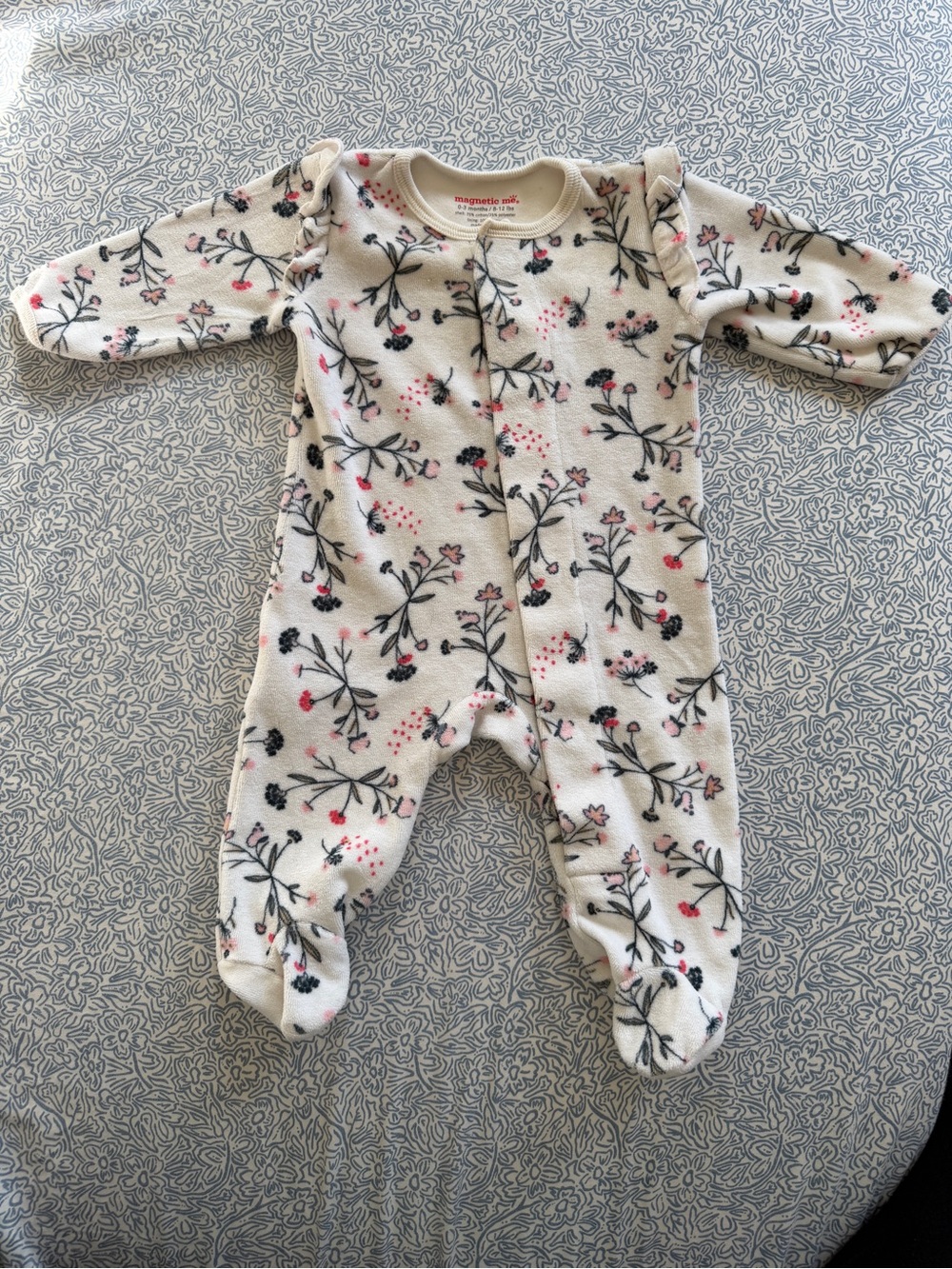 Magnetic Me Cream Floral Footed Onesie with Pink & Black Accents